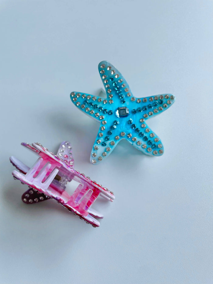 Side view of seashell-inspired hair claw clip – A detailed shot of a coastal-themed hair clip with elegant oceanic details