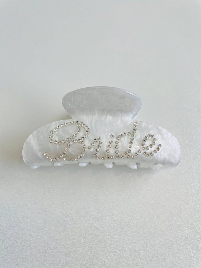 Close-up of the Rhinestone Bride Claw Clip – A sparkling hair claw clip featuring rhinestones that spell "Bride," perfect for weddings and bridal events.
