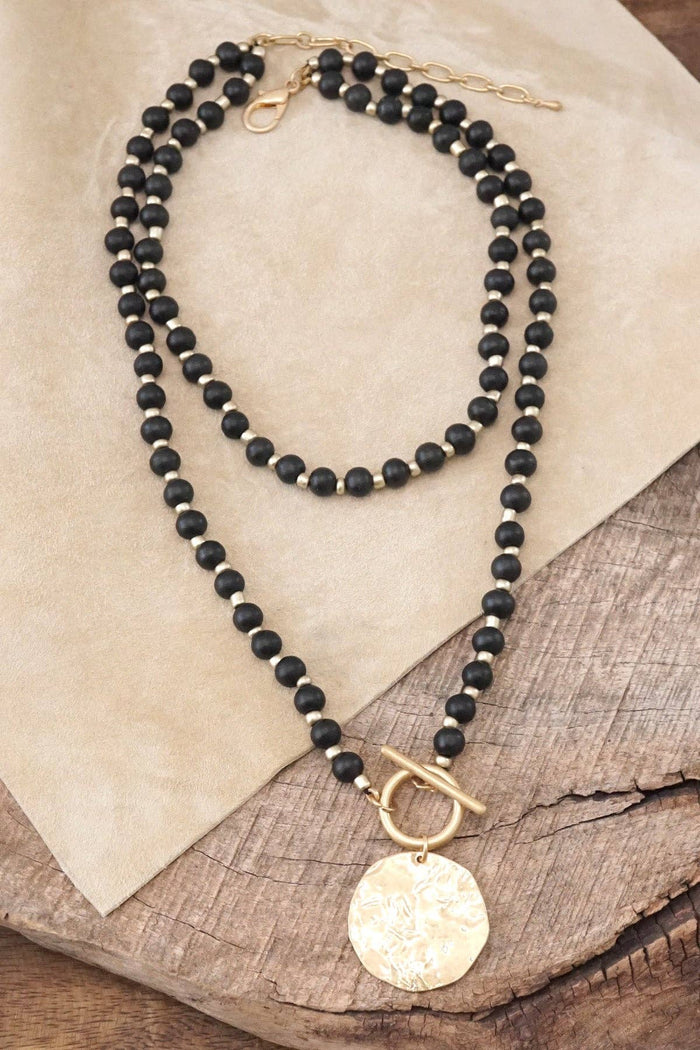 PennyLine inc Italian Jewelry: Multi Strand Wooden Beads Short Coin Necklace in Black and Gold