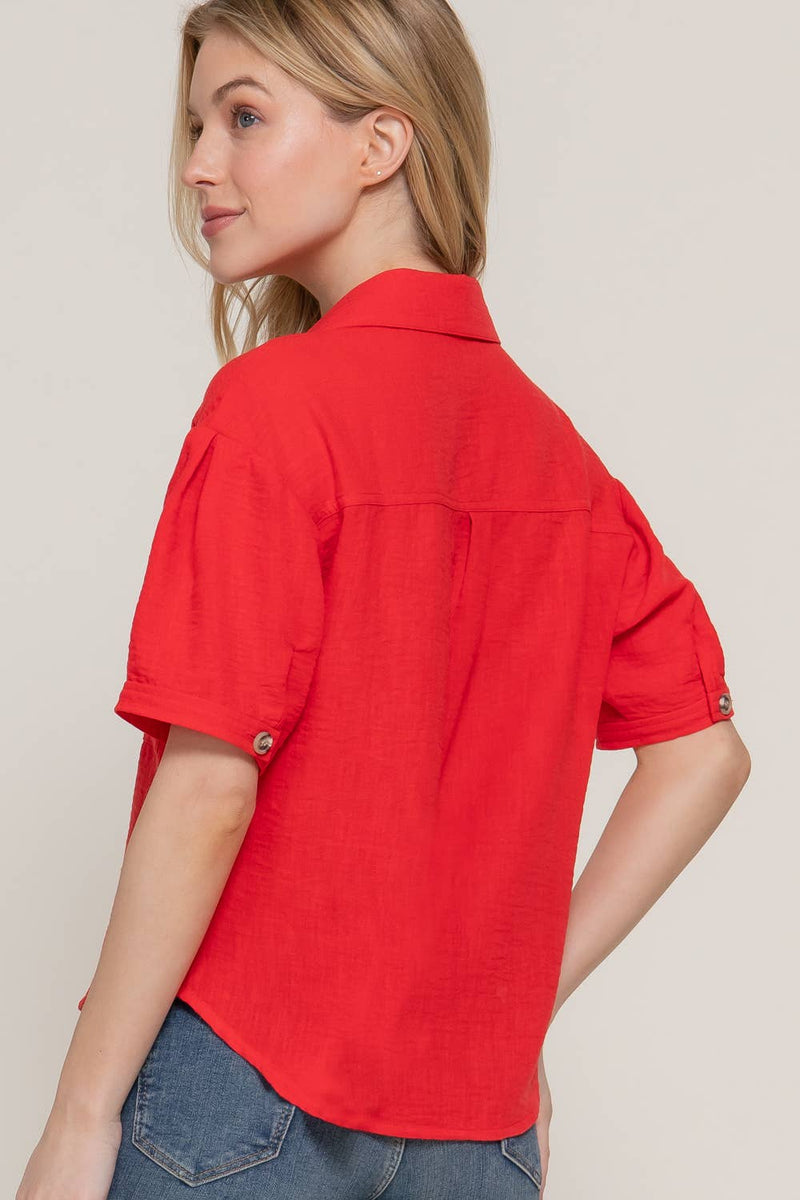 Back view of the red linen-effect shirt – A clean, classic look from behind, highlighting the smooth texture.

