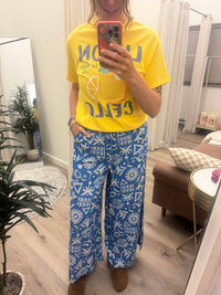 Printed Wide Leg Long Pants With Side Pockets Ruffled Elastic Waist And Drawstring High Waist