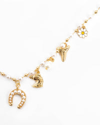 close up view of charms on neckalce